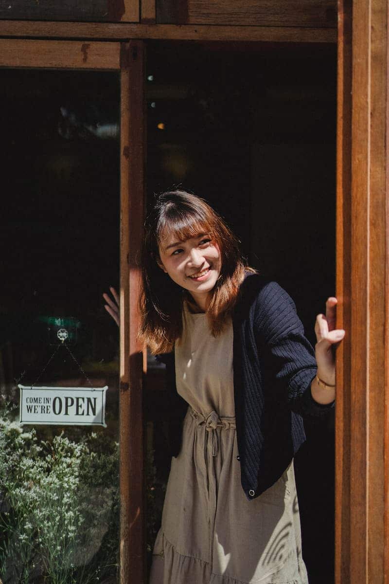 Woman Opening Shop