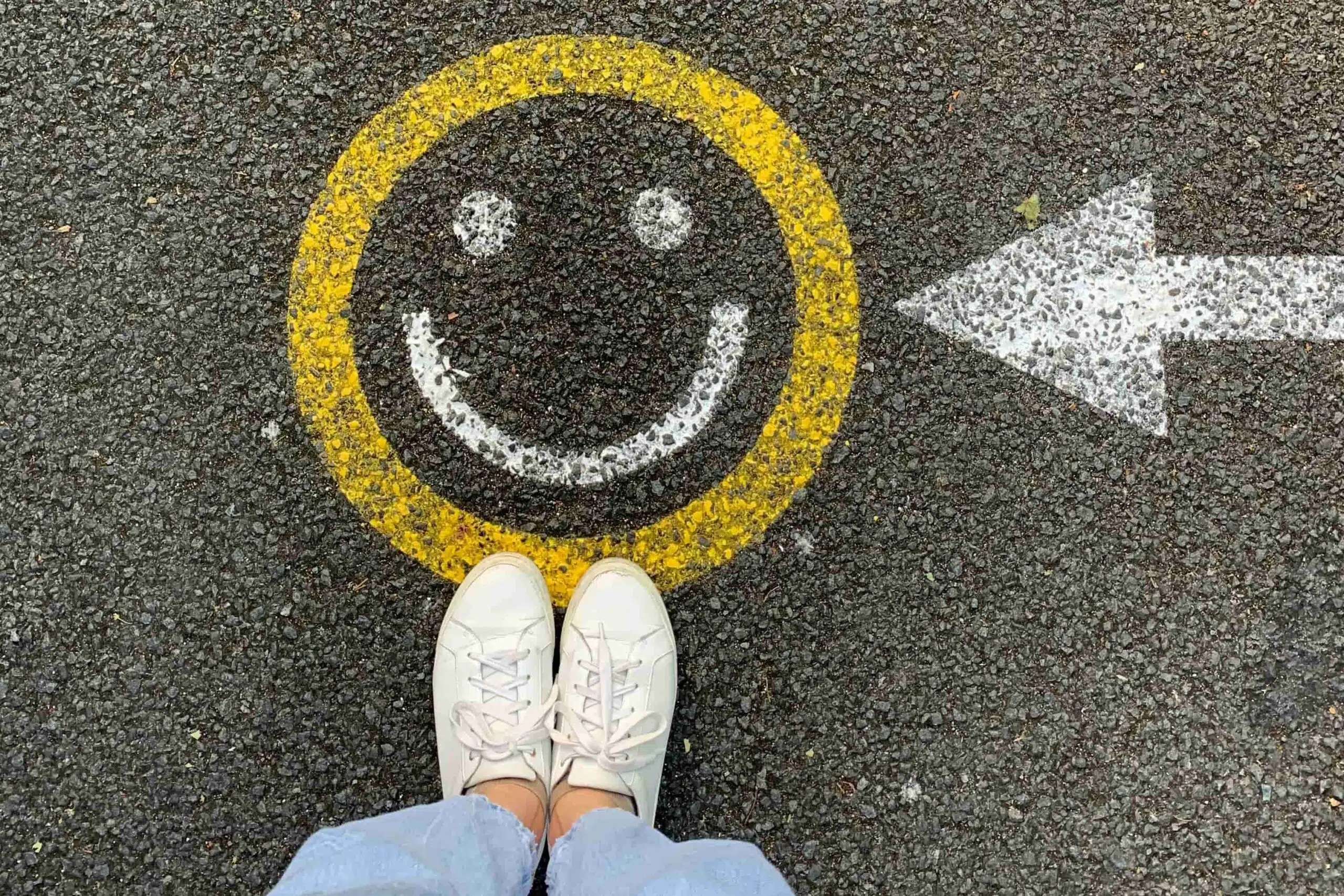 Smiley Face Drawn On Pavement | Employee Surveys | Mackman Research